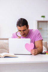 Young male student seeking love via Internet