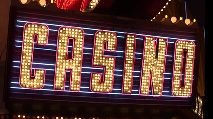 Las Vegas lights blinking in the night. Perfect for corporate videos, business projects, commercials, advertising, TV ads, YouTube videos, vlogs and more.