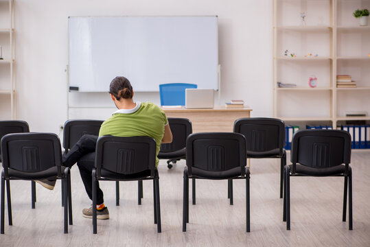 Young male student in business presentation concept