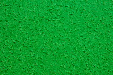 Light green concrete wall for interiors, art wallpaper or artistic texture background