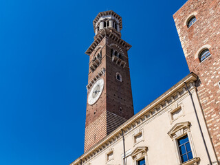 Fototapeta na wymiar Torre dei Lamberti in Verona, northern Italy, on blue sky background