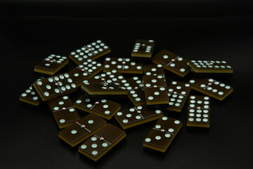 dominoes on black