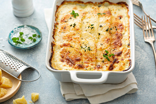 Cheesy Scalloped Potatoes With Thyme And Parmesan