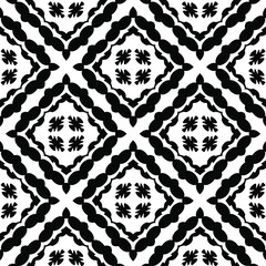 Geometric vector pattern with triangular elements. Seamless abstract ornament for wallpapers and backgrounds. Black and white colors.
