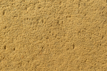 Surface of the old polyurethane for backdrop. Color - Barley Corn, Hue Yellow. Foam rubber with many bubbles and meshes.