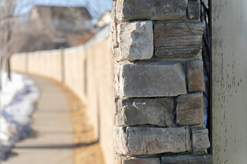 Wall beside pavement on street in winter