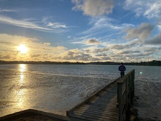 Sunset view for a calm beach, Herald Island in Auckland