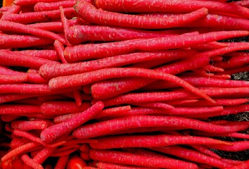 Red carrots which are high in lycopene that is another form of carotene.