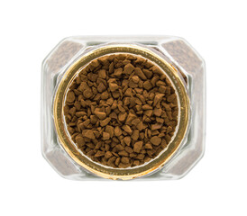 Instant granulated coffee in glass jar isolated on white background. Top view.