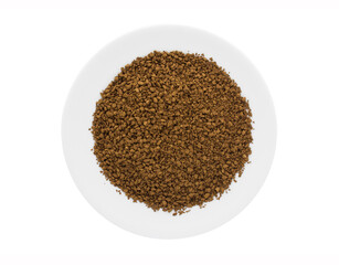 Instant granulated coffee in plate isolated on white background. Top view.