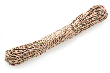 Roll of brown beige paracord rope isolated on white background. Safety nylon rope.