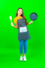 Portrait beautiful young asian woman wear apron with action on green background