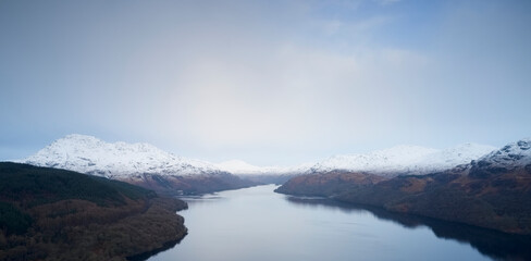 Fototapeta na wymiar Mindfulness calm aerial view from above Loch Lomond at sunrise in Scotland