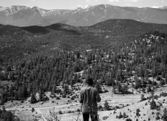Woman overlooking the mountains