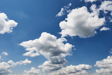 Blue sky background with clouds in summer day
