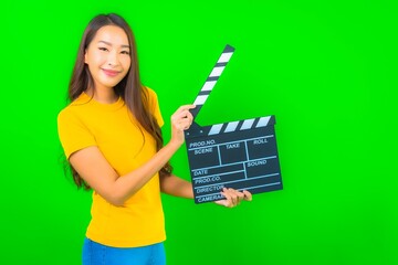 Portrait beautiful young asian woman with movie clapper