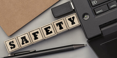 The word SAFETY made from wooden cubes. Conceptual photo