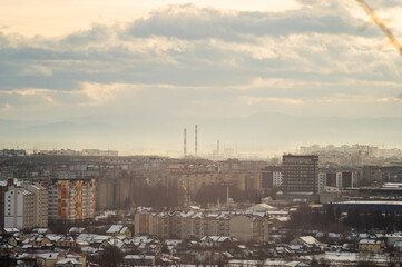 Naklejka premium City from a height in smog on a winter day