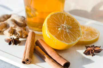 Autumn hot tea with lemon and spices