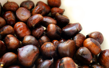 close up of chestnuts, fresh fruits