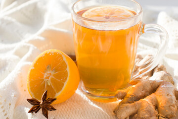 Autumn hot tea with lemon and spices