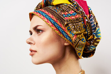 beautiful woman multicolored turban on her head decoration traditional clothing close-up