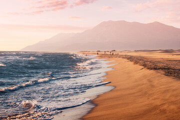 Sunset view of the Mediterranean coast near Patara beach in Turkey. High mesmerizing mountains in...