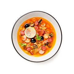 Traditional Russian meat soup Solyanka in bowl isolated on white background