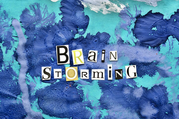 Word writing text Brain Storming from cut letters on abstract strokes blue background. Headline - Brain Storming, card of psychology . Psychologic concept.