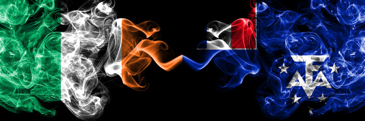 Republic of Ireland, Irish vs France, French Southern and Antarctic Lands smoky mystic flags placed side by side. Thick colored silky abstract smoke flags.