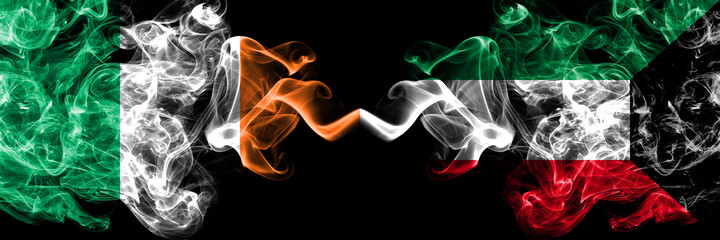 Republic of Ireland, Irish vs Kuwait, Kuwaiti smoky mystic flags placed side by side. Thick colored silky abstract smoke flags.