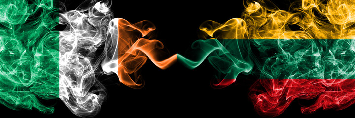 Republic of Ireland, Irish vs Lithuania, Lithuanian smoky mystic flags placed side by side. Thick colored silky abstract smoke flags.