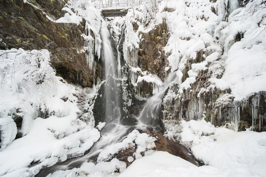 waterfall in winter in the snow, located  near fahl in the black forest in germany. (Fahler Wasserfall)