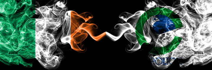 Republic of Ireland, Irish vs United States of America, America, US, USA, American, Carrollton, Texas smoky mystic flags placed side by side. Thick colored silky abstract smoke flags.