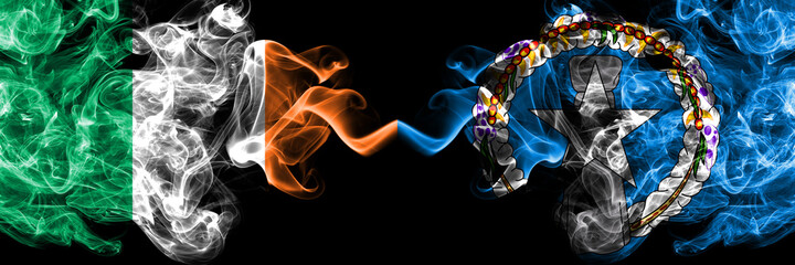 Republic of Ireland, Irish vs United States of America, America, US, USA, American, Northern Mariana Islands smoky mystic flags placed side by side. Thick colored silky abstract smoke flags.