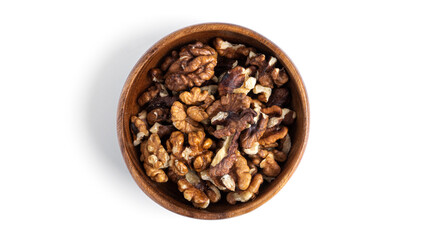 Walnut in wooden bowl isolated on a white background.