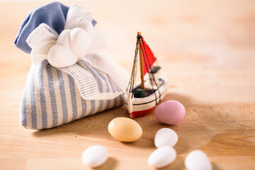 the almonds and the boat.
still life with sugared almonds and a boat. gift for wedding and newborn celebration - 408033463