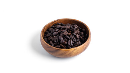 Coffee beans in wooden bowl isolated on a white background.