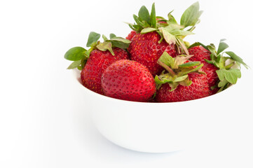 strawberries in white plate. isolated on white background