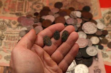 Vintage Bulgarian coins in hand