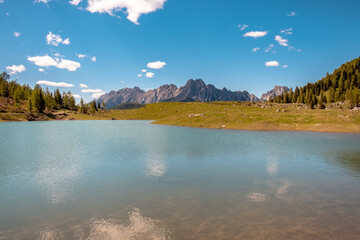 Calm lake in a sunny day  in the beautiful Carnic Alps, Friuli-Venezia Giulia, Italy