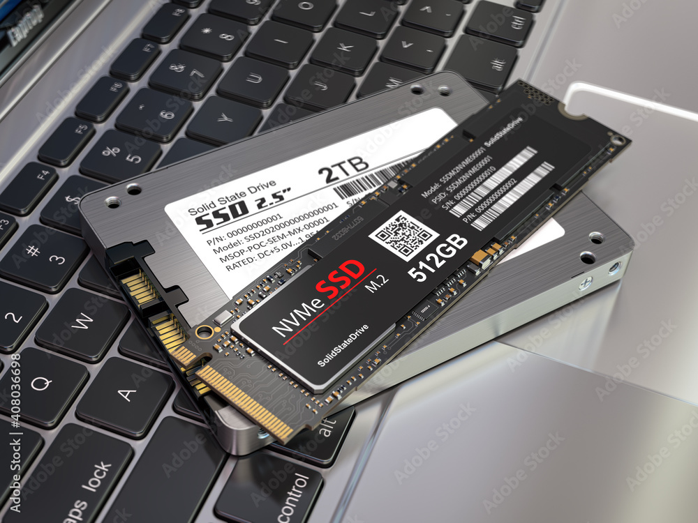 Poster Different types of SSD disk drive isolated on laptop keyboard. Classic SSD and SSD m2.
