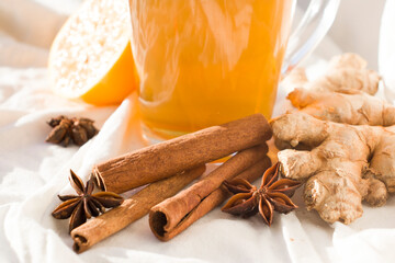 Autumn hot tea with lemon and spices
