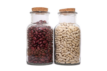 White Beans And Kidney Bean dried and preserved in glass jars isolated on a white background. Healthy nutritional preserved ingredients.
