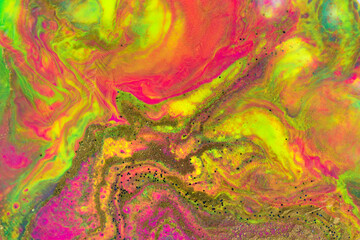 Abstract neon ink liquid texture with gold glitter. Marble imitation.
