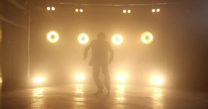 Dancing Man Against Flashing Lights