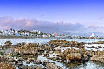 view of the beach and harbor at La Duquesa in Andalusia