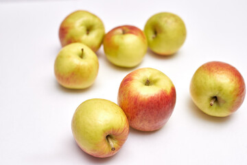 fresh apples on a white background, close-up