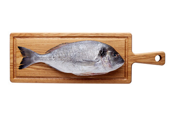Fototapeta premium Cutting board with dorado fish isolated on white background