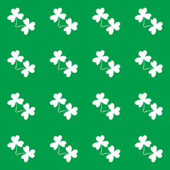 Patricks Day geometric seamless pattern with prnament of two repeating shamrocks. Simple vector elements.